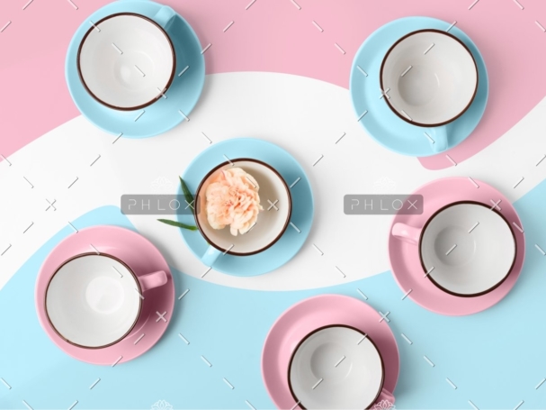 elegant-porcelain-blue-and-pink-cups-on-abstract-PRAGU4T